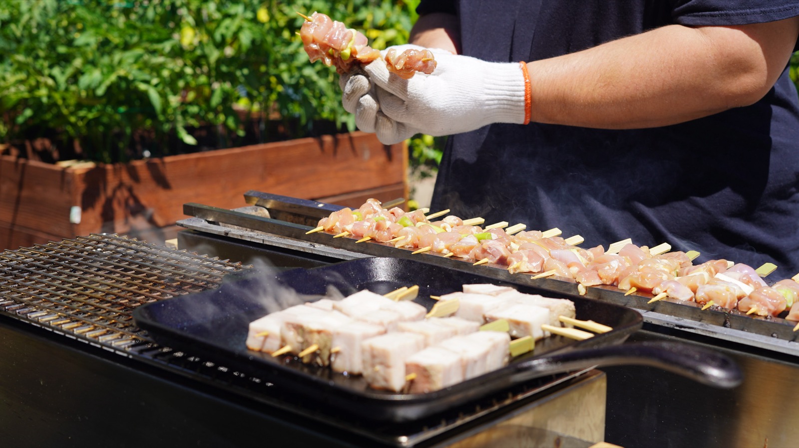Nick Faibisch grilling yakitori skewers over binchotan charcoal